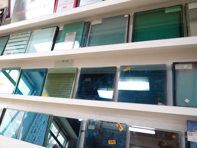 Architectural glass samples displayed on factory sample rack