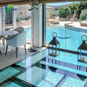 Walkable Clear Laminated Glass Floor installed over indoor water feature