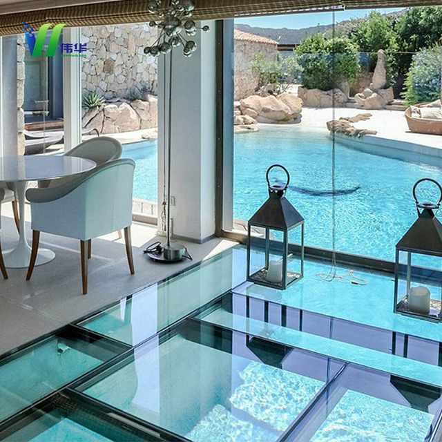 Walkable Clear Laminated Glass Floor installed over indoor water feature