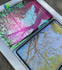 Reflective Chameleon Glass Panel with Pink and Green Hues