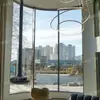 Custom Curved Laminated Glass for Atrium Skylights, Panoramic Elevators & Spiral Staircase Balustrades